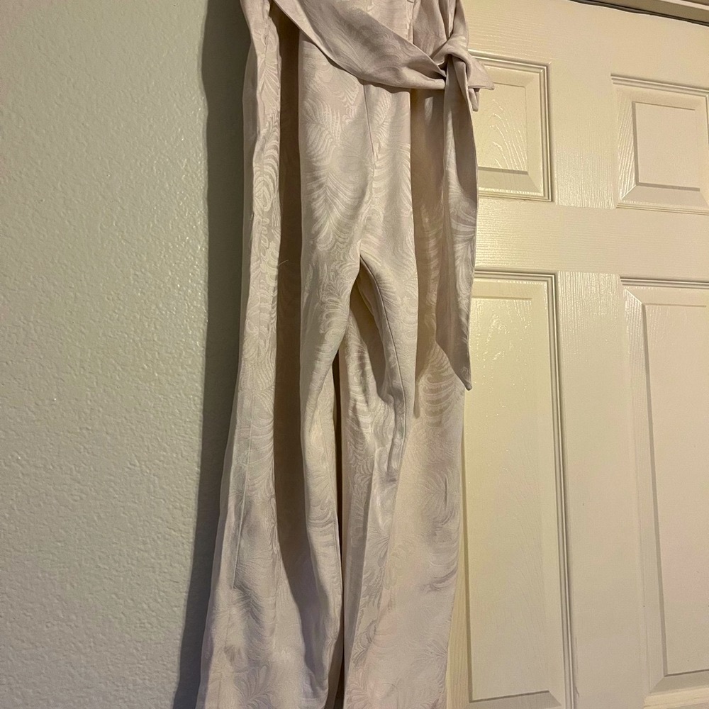 H&M off white size 6 silky/viscose/polyester material not too thick